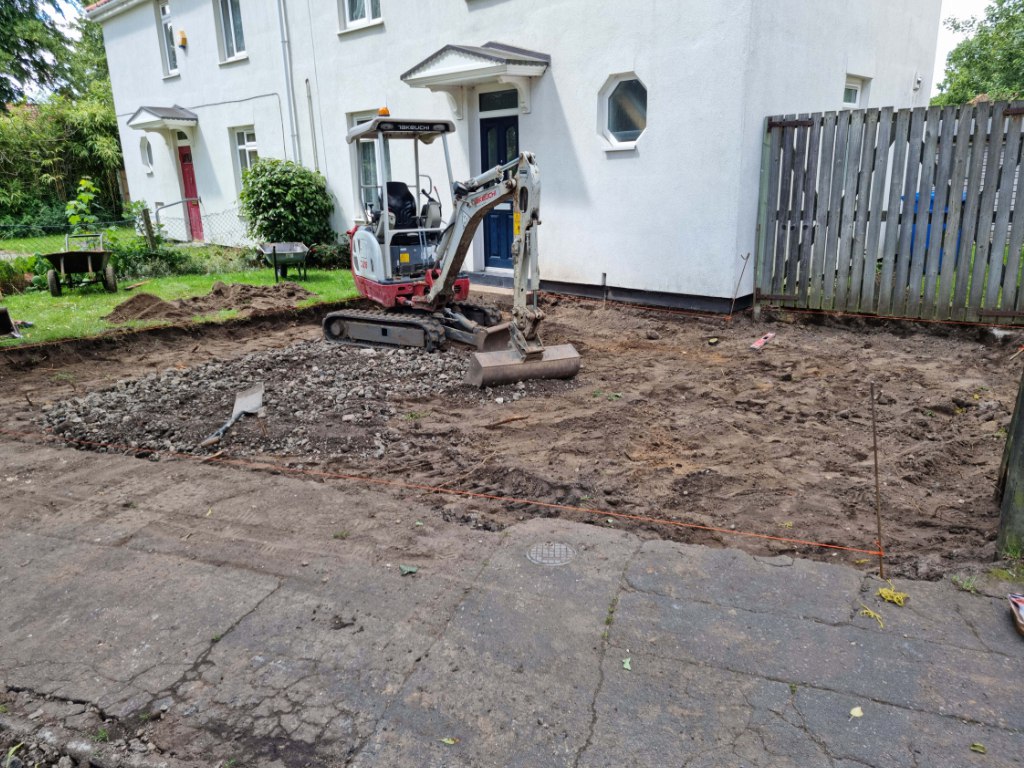 This is a photo of a dig out being carried out by NS Driveways Chertsey in preparation for a block paving driveway