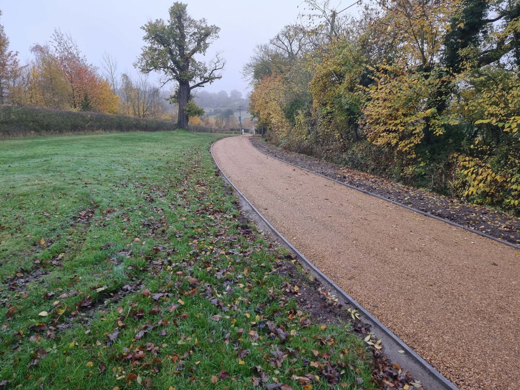 This is a large driveway which has just had a tar and chip driveway installed on by NS Driveways Chertsey